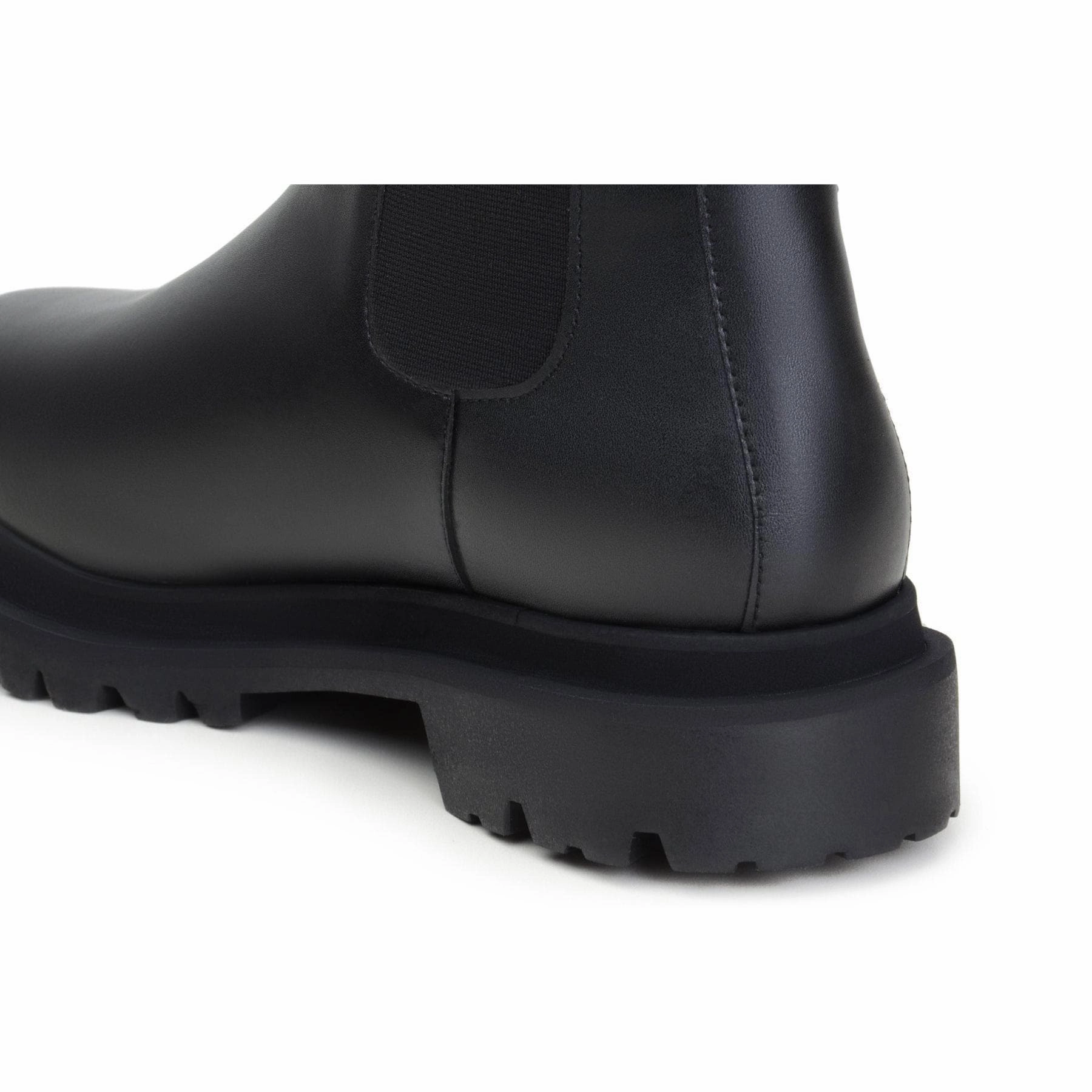 'Chloe' black vegan-leather chelsea boot with chunky sole by Zette Shoes Matte Combat Boots