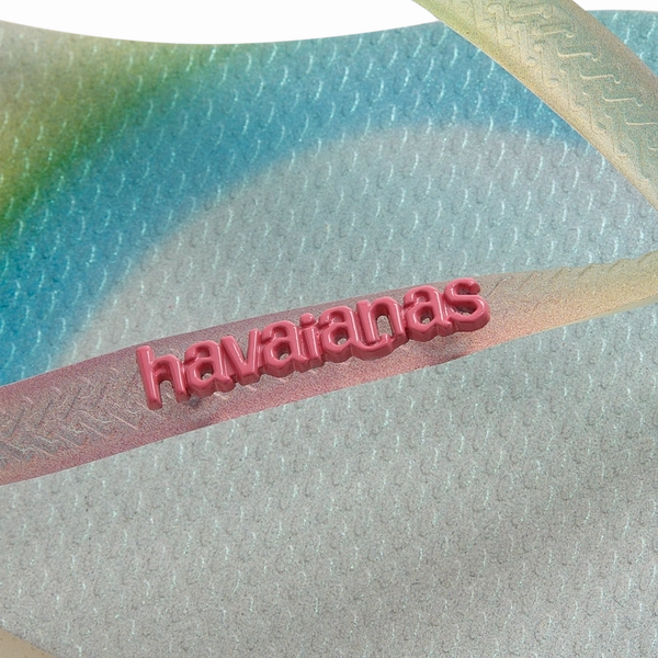 HAVAIANAS SLIM METALLIC RAINBOW- BEIGE Flip Flops On A Plane